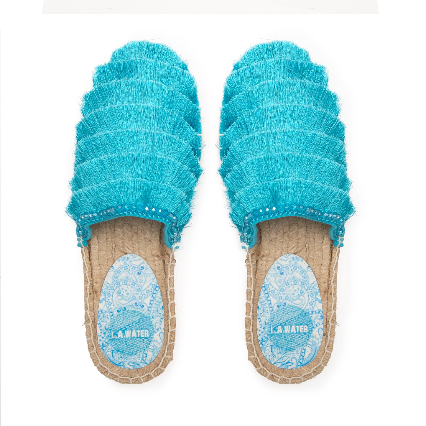 MULES WITH LIGHT BLUE FRINGES