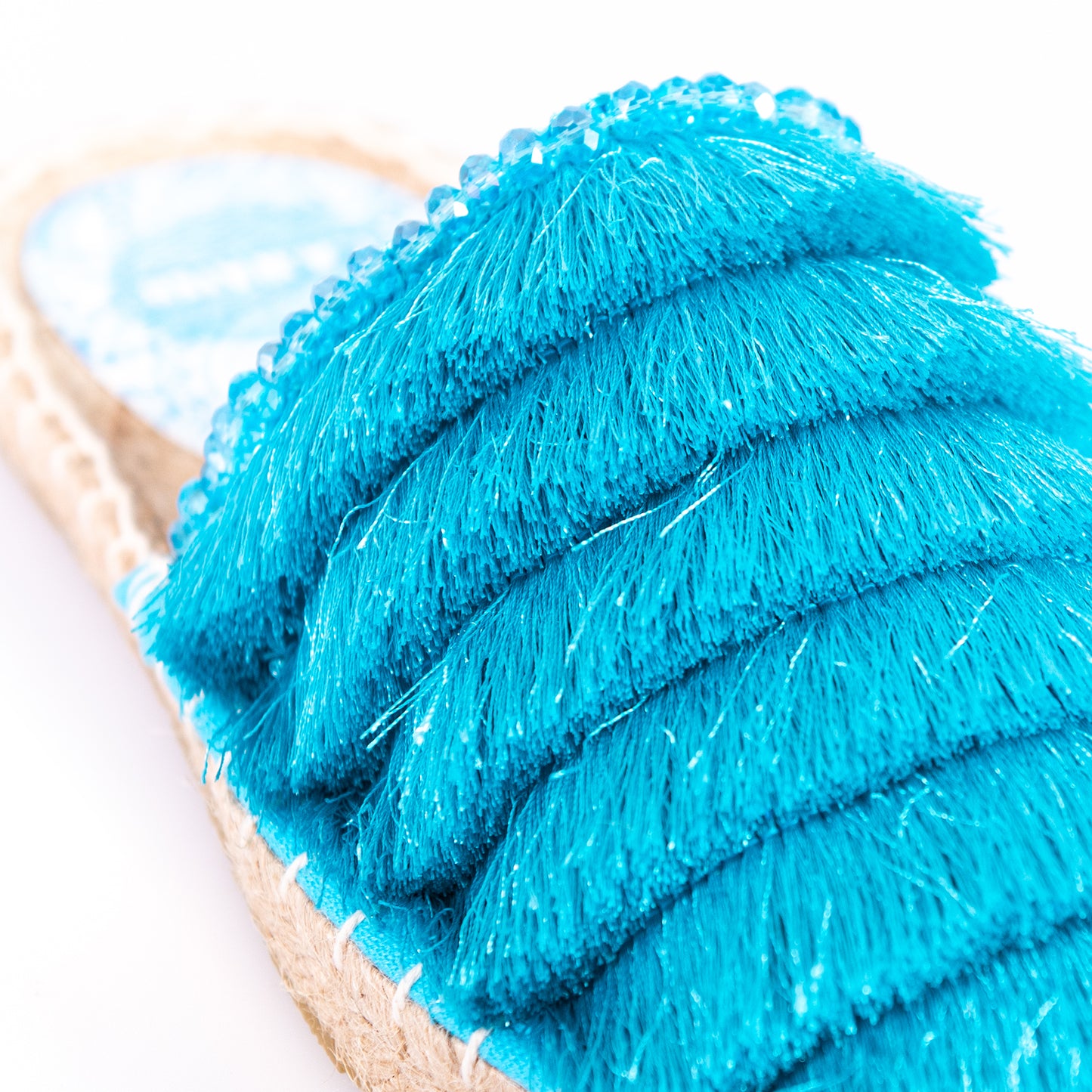 MULES WITH LIGHT BLUE FRINGES